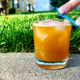 A fingerboard being "ridden" on the rim of a cocktail